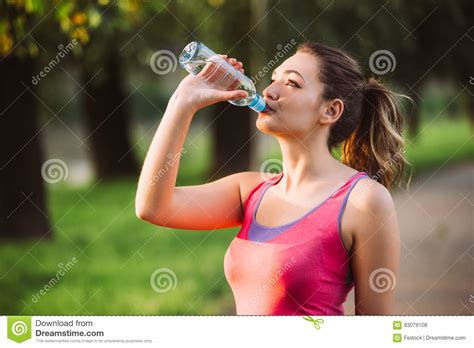 Thirsty Woman Holds Water Bottle Thirst And Water Balance Concept