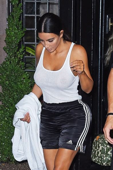 Kim Kardashian Goes Braless In Sheer White Tank Top