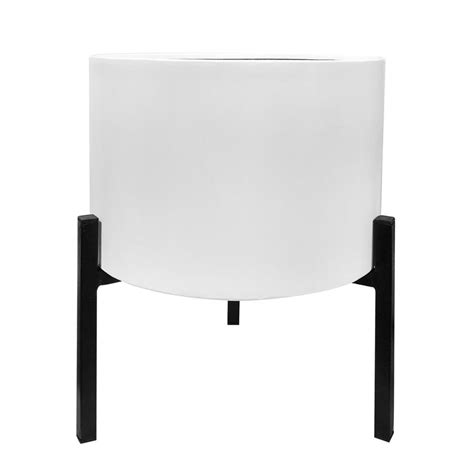 Brighten any room with a hanging metal planter beside the window for modern decor that takes up neither cabinet nor floor space. Unbranded White Steel Planter with Stand-42077 - The Home ...