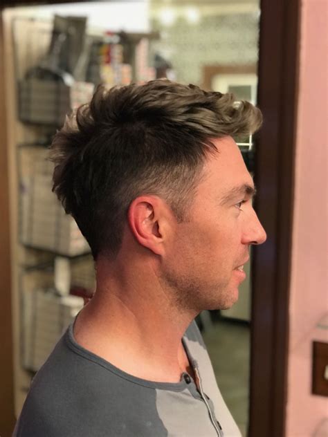 Maybe you would like to learn more about one of these? Low fade with longer top done by Katy | Mens fade, Long ...