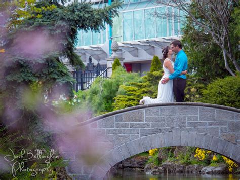 Bride And Groom Kissing In A Beautiful Garden Romantic Wedding Picture