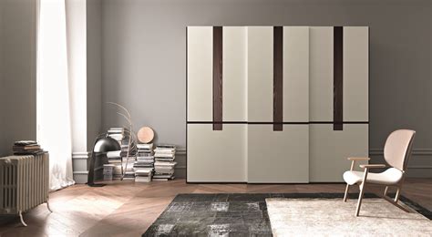 With everything you could need in one neat condensed space, this modern wardrobe features sleek, chrome handles that take up the bottom half of the doors and is perfect for any smaller bedroom. 35 Modern Wardrobe Furniture Designs