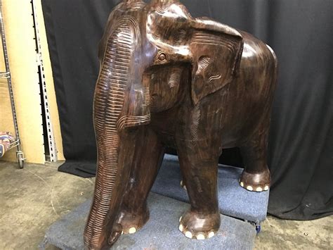 large solid exotic wood carved elephant carving measures 36 tall x 42 long x 22 wide able
