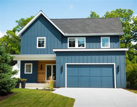 Gray gray number of stories: The navy exterior paint color is Benjamin Moore Blue Note ...