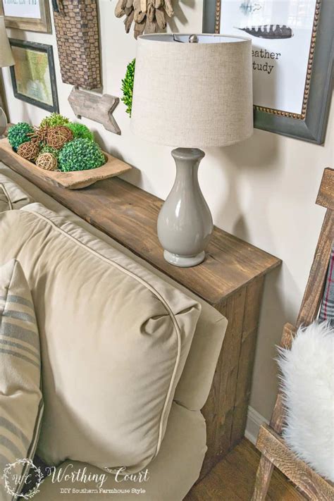 The woodgrain color amd texture looks really good against the cooler gray tones of the overall decoration and the unit is great as an office style storage space. How To Build A Rustic Sofa Table | Worthing Court