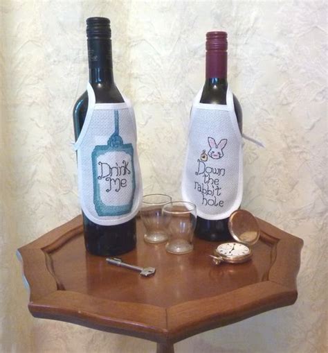 There are no reviews at the moment. Wonderland Bottle Aprons - cross stitch kit by Julie Lynes ...