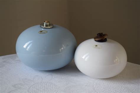 We want this to be a fun friendly safe place for fellow nascar collectors to buy. Höganäs Keramik Swedish Vintage White Ceramic Oil Lamps. D ...