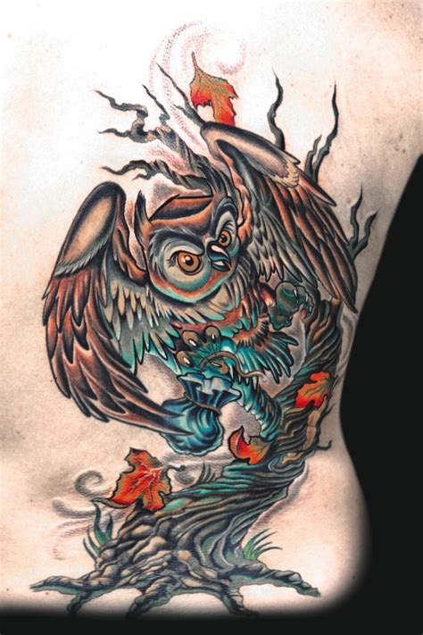 Black tribal flying owl tattoo design. Attractive Flying Owl With Tree Tattoo On Full Back ...
