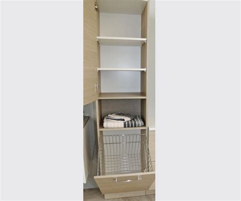 If you want your dirty laundry to air out to help prevent the growth of smelly bacteria, look for a hamper with air holes. Tower Laundry Hamper and Vanity - Classique Vanities 07 ...