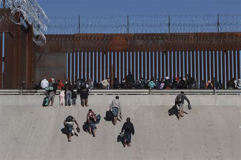 migrant flows plummet across texas mexico border is success for biden s policy in sight