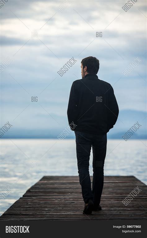 Lonely Man Walking On Image And Photo Free Trial Bigstock