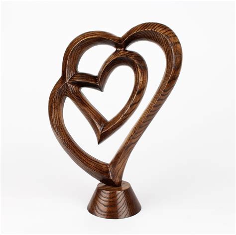 Some of the technologies we use are necessary for critical functions like security and site integrity, account authentication, security and privacy preferences, internal site usage and maintenance data, and to make the site work correctly for browsing and transactions. Wooden Entwined Hearts Sculpture Romantic Anniversary gift ...