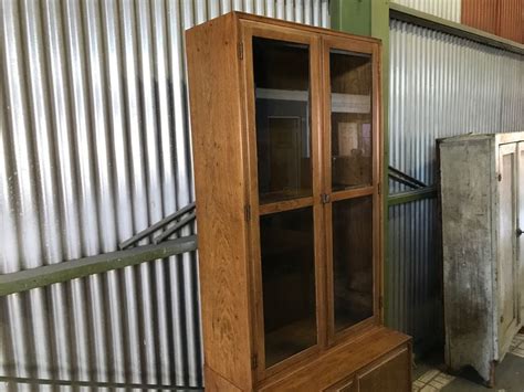 The panels in cabinet doors can be either raised panels or inset panels. 2-Piece Mid-Century Wooden Cabinet With Beveled Glass And Cane Front Cabinet Doors