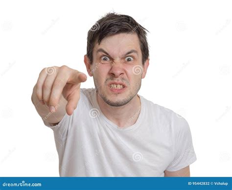 Angry Young Man Is Pointing Towards You Isolated On White Background