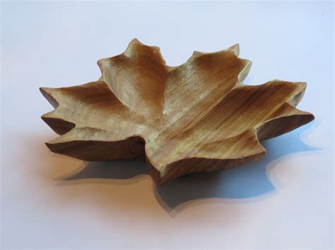 Maybe you would like to learn more about one of these? Maple Leaf Bowl - Canary Wood - Morel Wood Carving