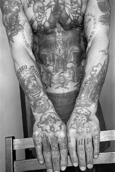 decoding the hidden meaning behind russian prison tattoos photos