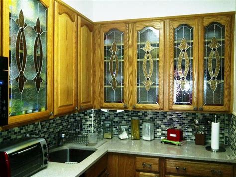 For those that suffer from design restlessness, they're also an easy way to allow for a change of scheme, with quick color changes instantly achieved via dishware or holiday décor. Hand Crafted Elegant Stained Glass Custom Kitchen Cabinet ...