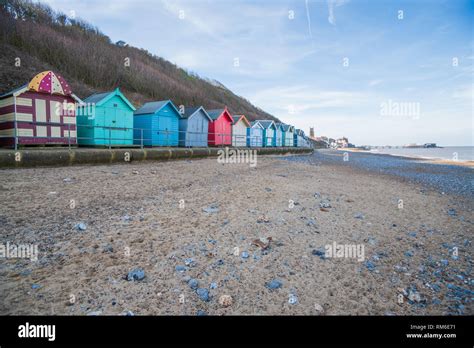 Rows Of Beach Huts On The Seafront At Cromer Norfolk Coast Stock Photo