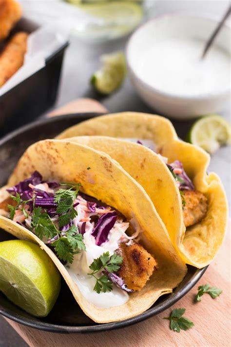 Easy Baja Fish Tacos Topped With Creamy Cilantro Lime Slaw