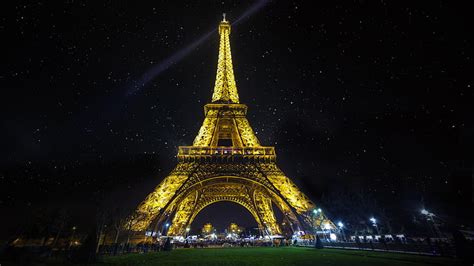 Torre eiffel iluminado torre paris frança europa noite estrelada HD papel de parede