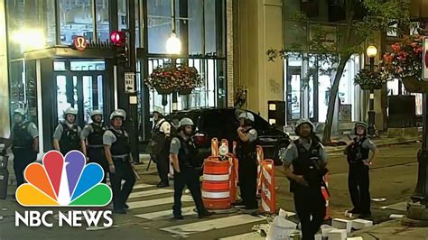 13 Officers Injured More Than 100 Arrested In Chicago After Police