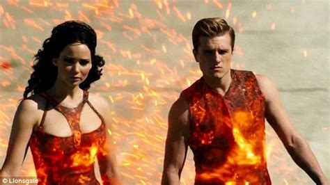 Girl On Fire Katniss And Peeta Jennifer Lawrence And Josh Hutcherson