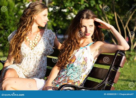 Two Beautiful Young Women Having Fun In The City Stock Photo Image Of