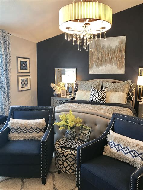 By painting the ceiling, you can create maximum impact, as shown in this navy and grey living room. Yellow Door Interior: Navy and Grey Master Bedroom ...