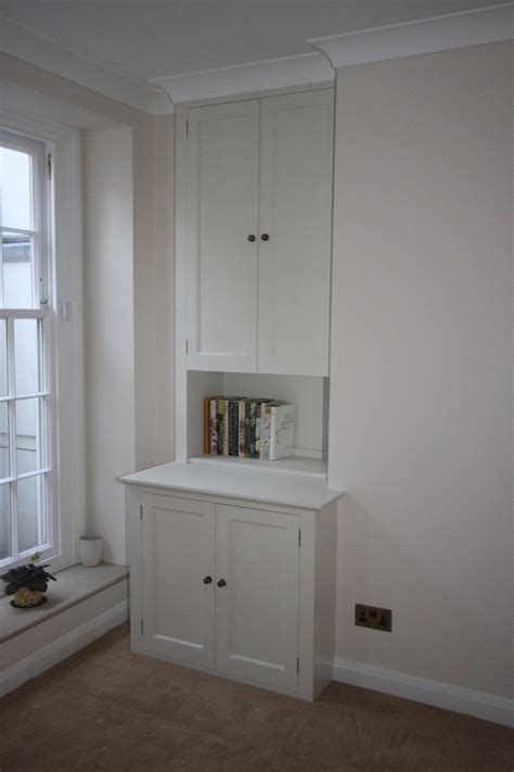 If you have a good router table, you may want to try it yourself. Painted Built in Alcove Cabinet - Nigel Northeast