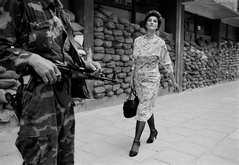 Meliha Varesanovic Photo By Tom Stoddart Even In The Middle Of A War A Bosnian Woman Holds Her