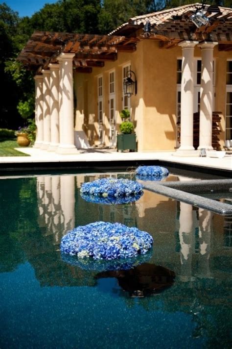 If your venue has a pool or pond, get creative with your wedding flower ideas. Floating Flower Wedding Decorations Part 1