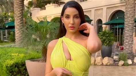 Nora Fatehi Flaunts Hourglass Silhouette With Winning Look In Neon Green Bodycon Dress Worth