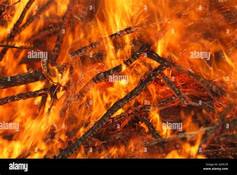 Flames and radient heat from intense fire of burning sticks Stock Photo ...