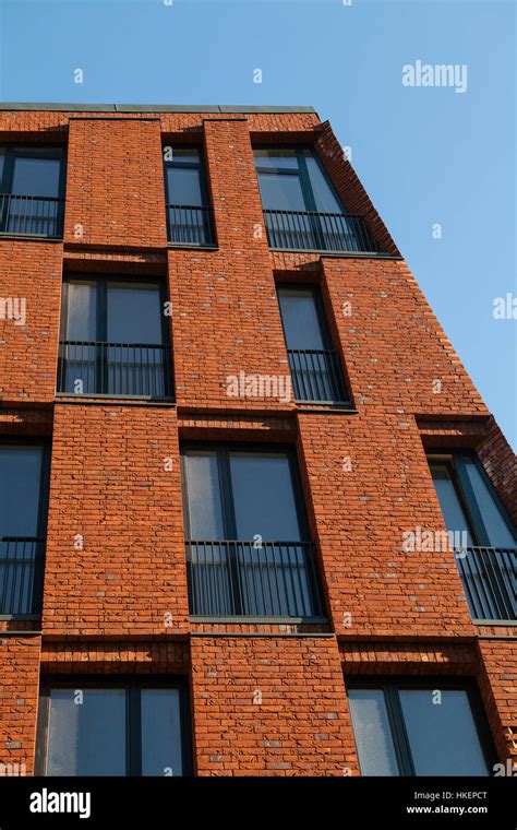 Facade Of Modern Brick Apartment House Conceptual Design Stock Photo