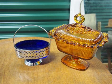 Get the best deals on glass butter dishes. Yellow Glass Butter Dish with Lid,, and Blue Glass Candy Dish.