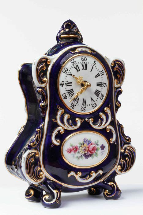 Bohemian porcelain clock in baroque style -- former ...