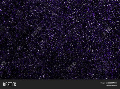 Purple Glitter Texture Isolated On Black Magenta