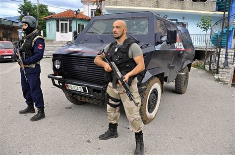 Albanian Police Officers Stand Guard During An Anti Drug Operation In