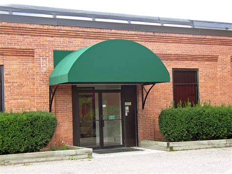 Commercial awnings and canopies get a custom awning built to your specific needs. arch.jpg