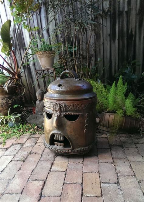 Covering our method of creating tumbled tempered glass for use in fireplaces and fire pits. Spectacular Terra Cotta Mean Faced Fire Pot | Etsy | Fire ...