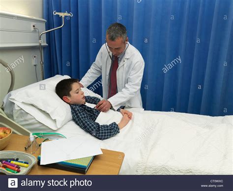 Doctor Examining Patient Hi Res Stock Photography And Images Alamy