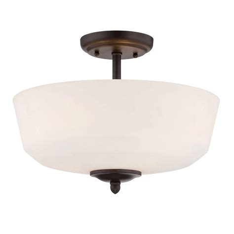 The seeded glass bell shade combined with the rubbed bronze metal, make this pendant a perfect addition to your space. Designers Fountain Darcy 3-Light Oil-Rubbed Bronze Semi ...