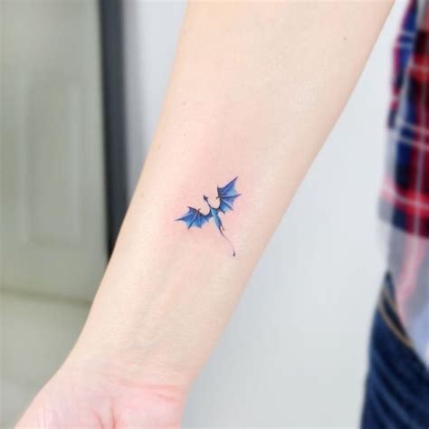 Small Blue Dragon Flying Forearm Tattoo Dragon Tattoos For Women