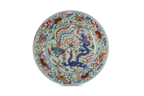 It originates from those small fishing village around north coast of taiwan. Sold Price: A CHINESE WUCAI 'DRAGON AND PHOENIX' DISH ...