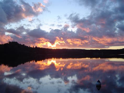 Free Stock Photo Of Sunset Behind Forest Hills Overlooking Lake