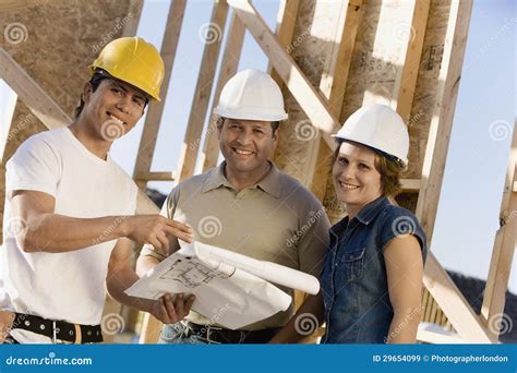 Contractors Discussing At Construction Site Stock Image Image Of