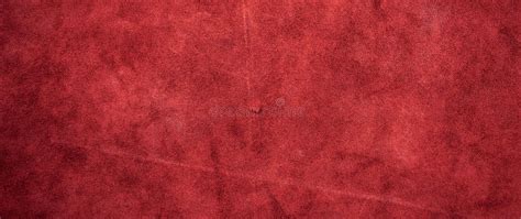 Red Matte Background Of Suede Fabric Closeup Velvet Texture Of