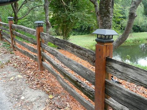 You can call them split rail, zigzag, worm, or serpent fencings, yet the reality stays that these wonderful rustic fences are the perfect decorative border for nation, home, cabin, or rustic homes! Dressed up split rail fence | Fence landscaping, Backyard ...