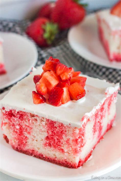 Cake with jello drizzles poked throughout, and topped with a smooth layer of whipped cream! Jello Poke Cake Recipe (+ VIDEO) - How to make a Jello ...