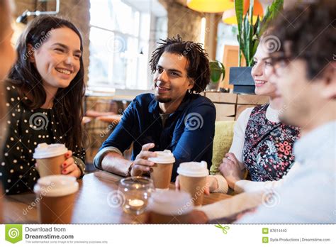Happy Friends Drinking Coffee At Restaurant Stock Photo Image Of